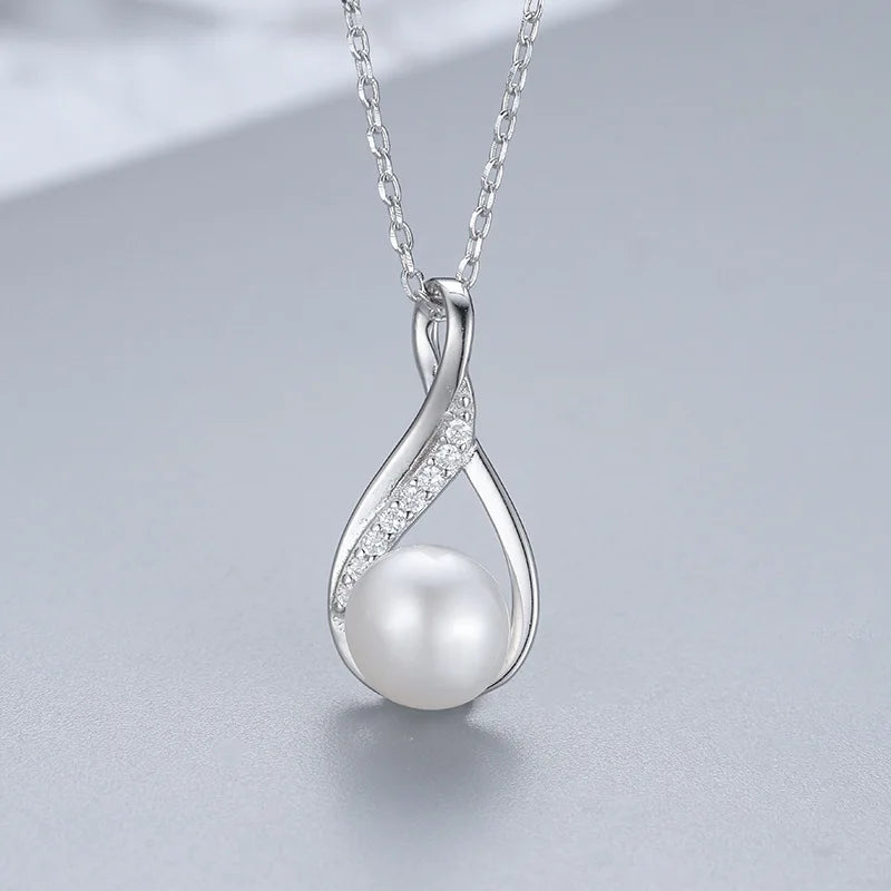 Elegant Essence: Pearl and Silver Jewelry Set