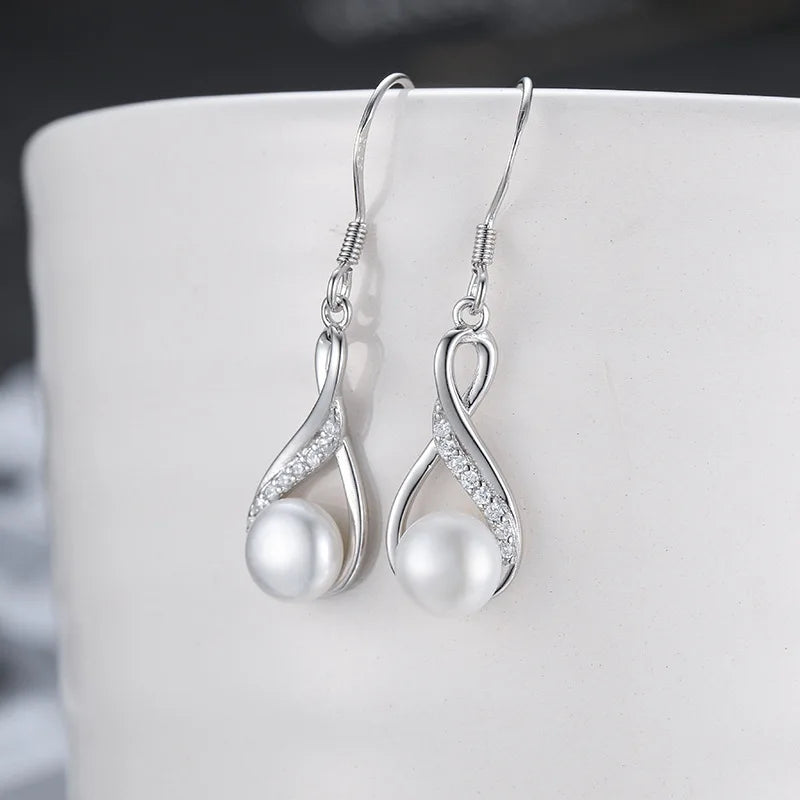 Elegant Essence: Pearl and Silver Jewelry Set