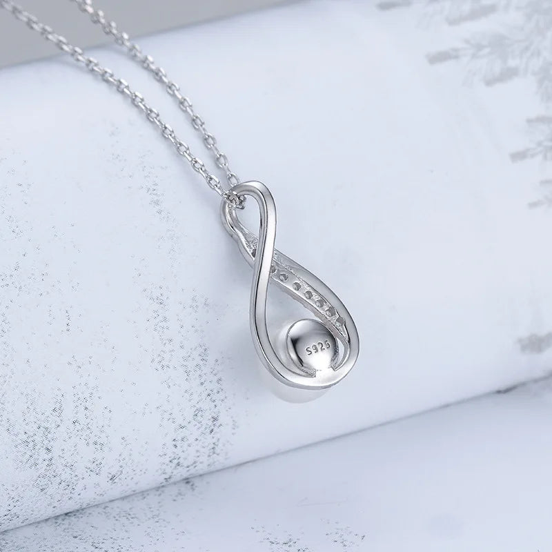 Elegant Essence: Pearl and Silver Jewelry Set