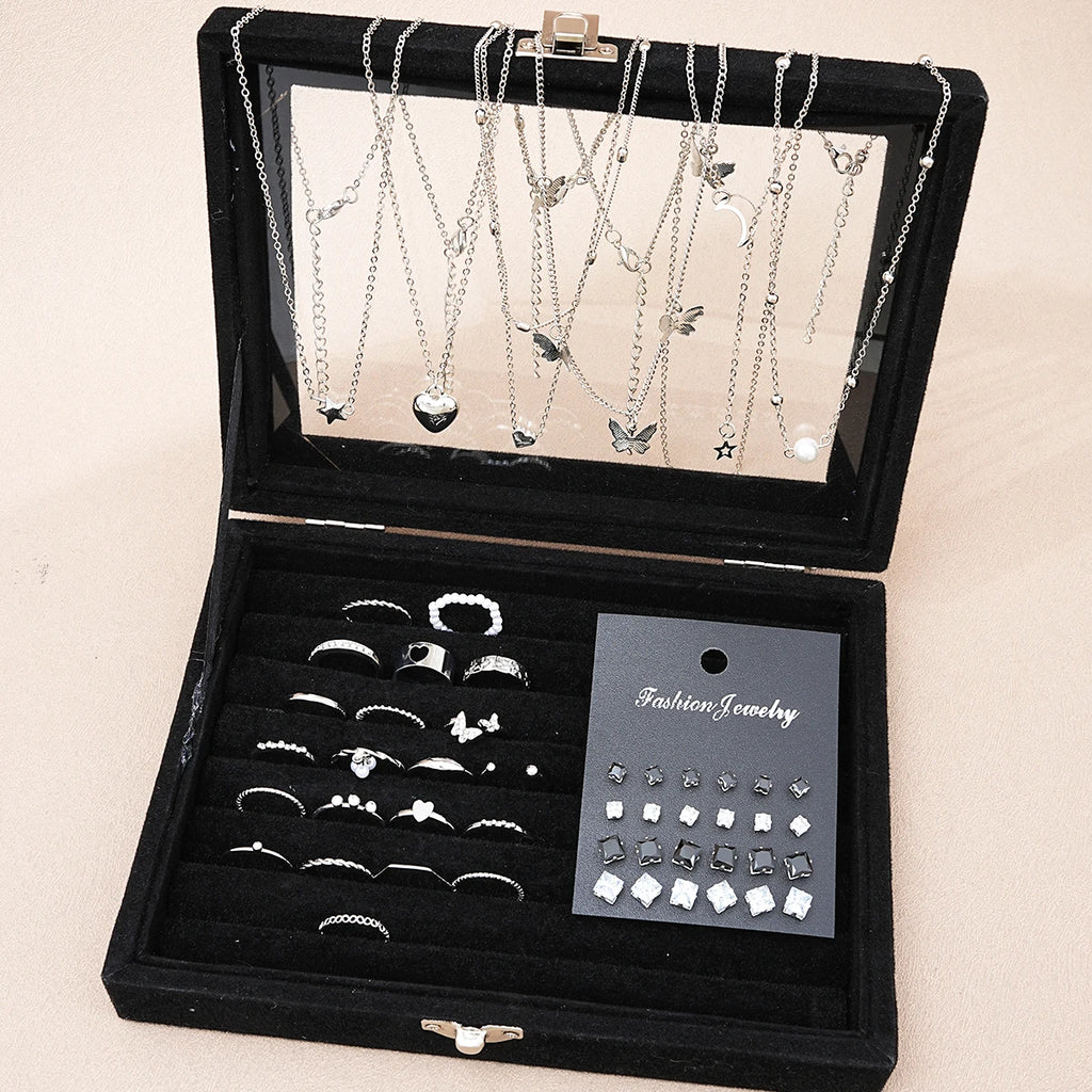 Fashionista’s Dream: 51-Piece Silver Jewelry Set Featuring Pearls and Whimsical Designs