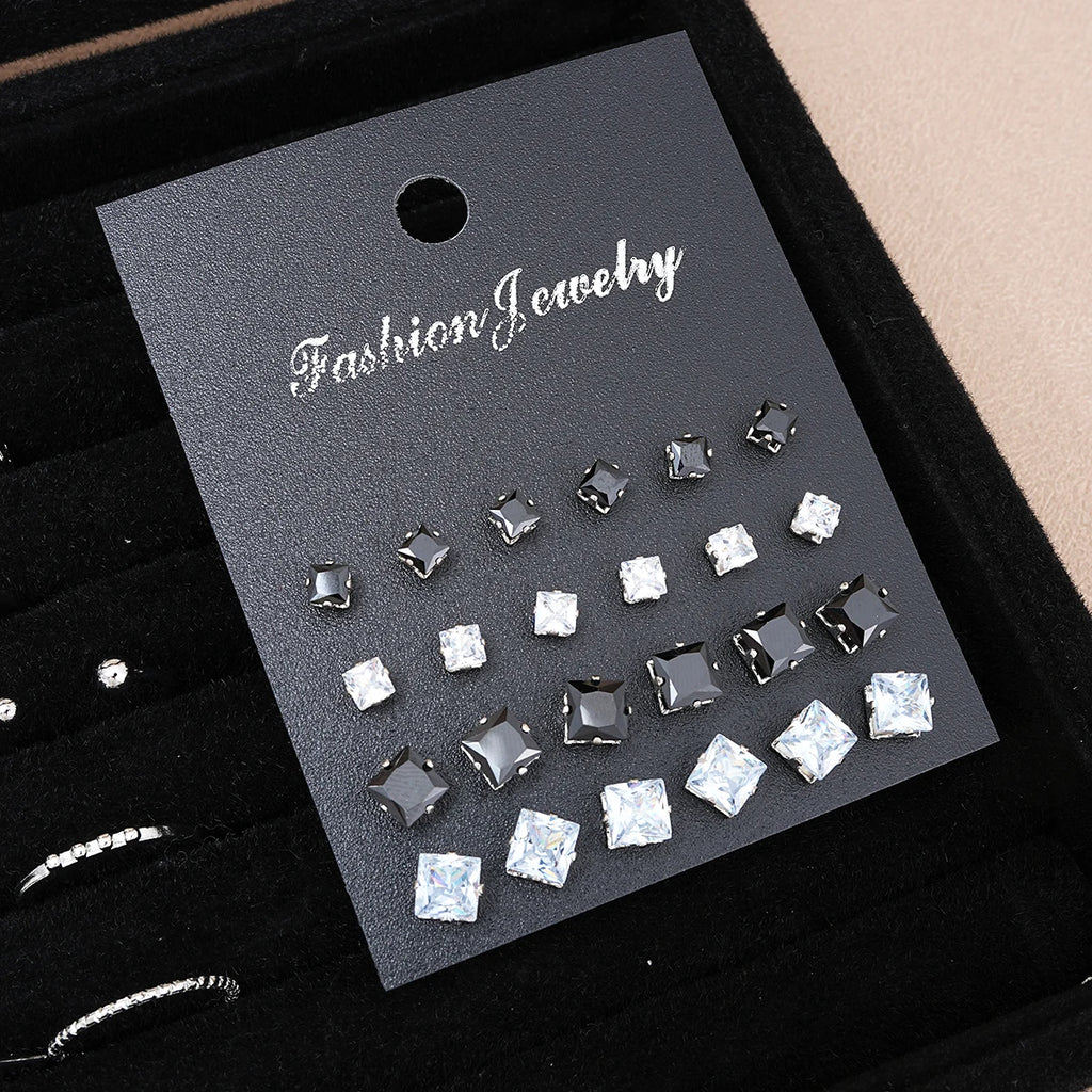 Fashionista’s Dream: 51-Piece Silver Jewelry Set Featuring Pearls and Whimsical Designs