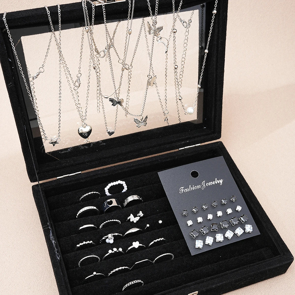 Fashionista’s Dream: 51-Piece Silver Jewelry Set Featuring Pearls and Whimsical Designs