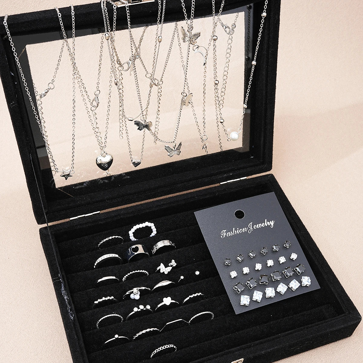 Fashionista’s Dream: 51-Piece Silver Jewelry Set Featuring Pearls and Whimsical Designs
